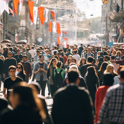 crowd of people walking outside